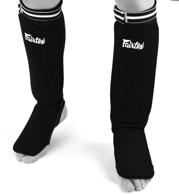 Sample shin guards designed for Muay Thai and kickboxing training. Raptors Muay Thai will offer custom-branded versions providing protection and secure fit during sparring and drills.