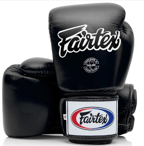Example image of high-quality boxing gloves available in multiple sizes. Final products will be custom-made with Raptors Muay Thai branding for durability, comfort, and style.
